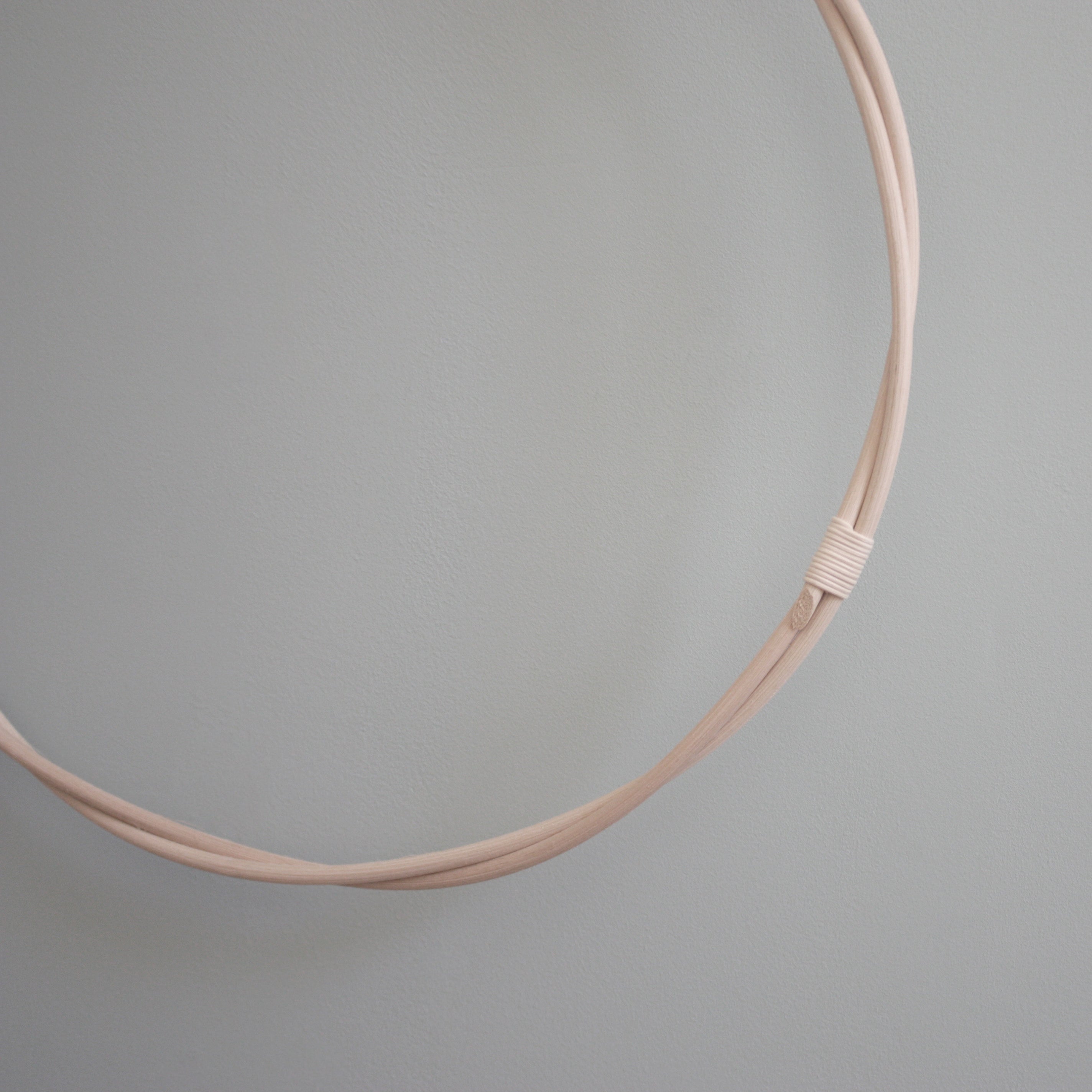 détails et finitions tout en rotin de notre cercle en rotin made in france