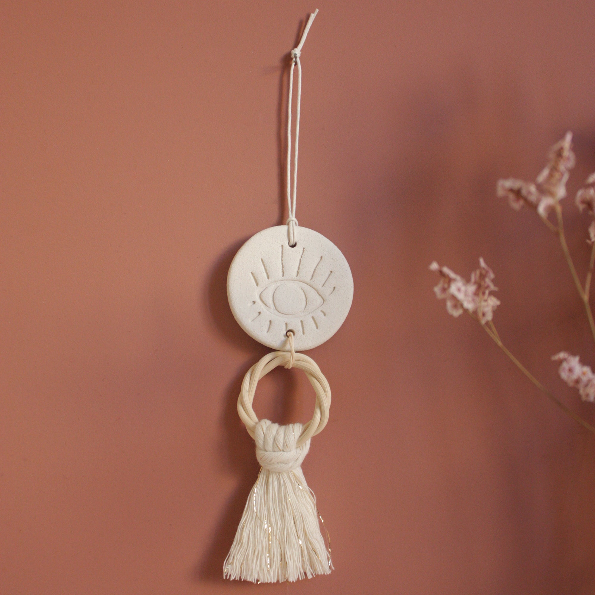 ceramic eye pompom medallion