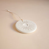 ceramic sun medallion