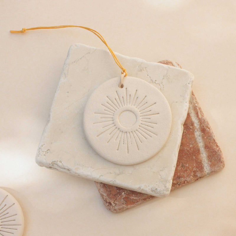 ceramic sun medallion